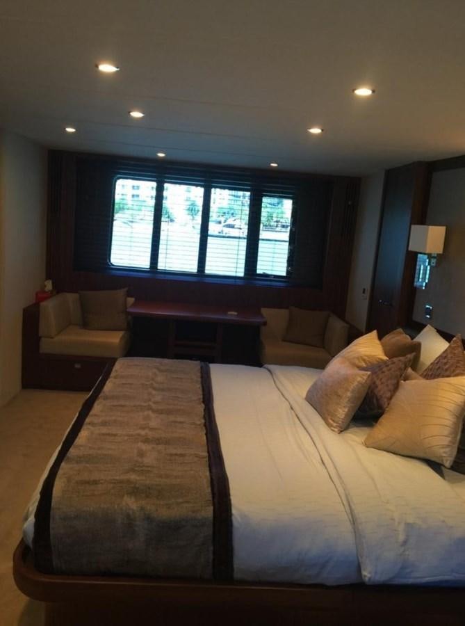 a large bed in a hotel room aboard PRINCESS 85MY Yacht for Sale