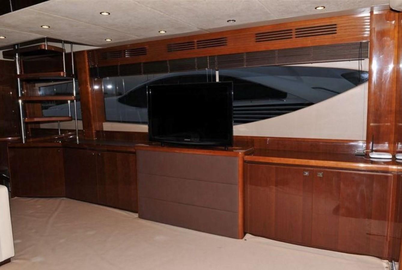 a large tv in a room aboard PRINCESS 85MY Yacht for Sale