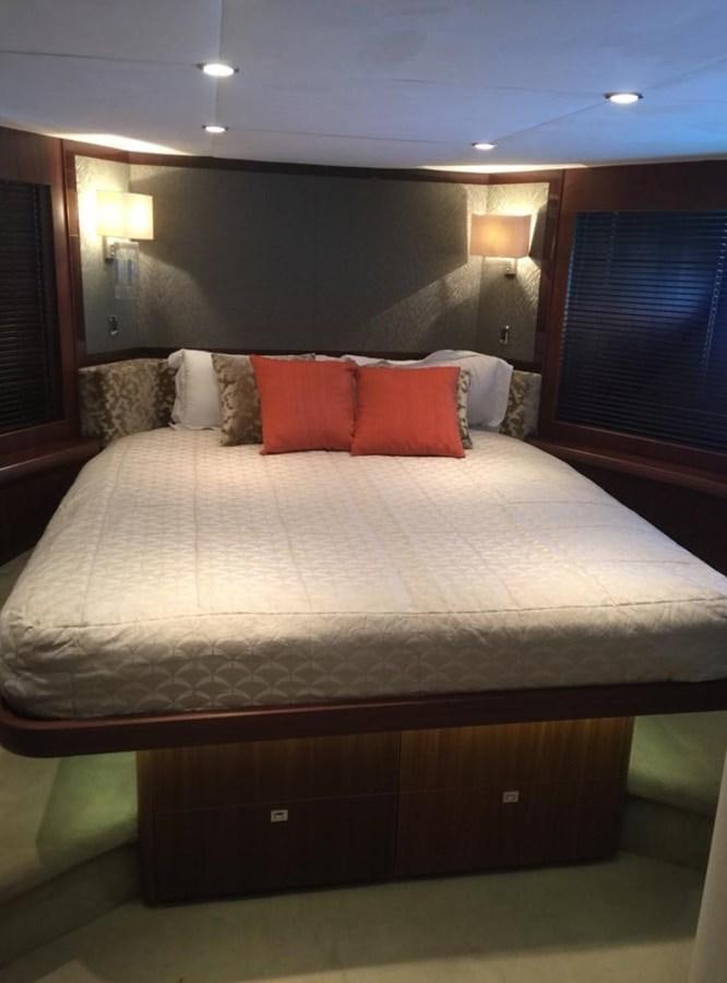 a bed with pillows aboard PRINCESS 85MY Yacht for Sale
