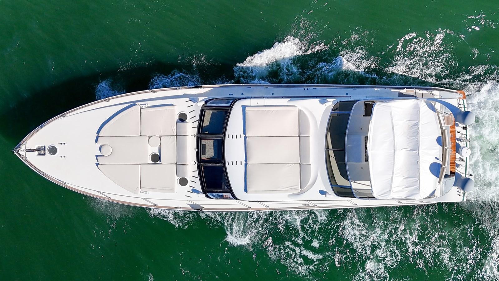a helicopter flying over a body of water aboard ZOOOM Yacht for Sale