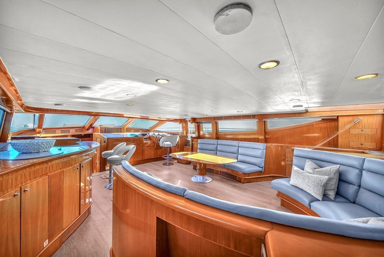 a large room with a couch and a table aboard ZOOOM Yacht for Sale