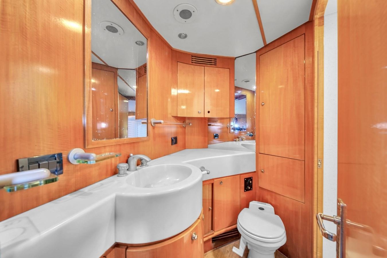 a bathroom with a sink and a toilet aboard ZOOOM Yacht for Sale