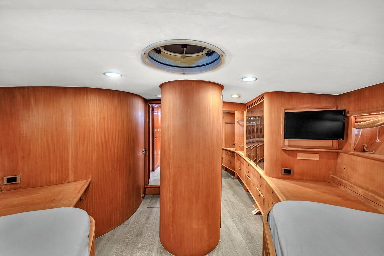 a room with a wood wall and a wood floor aboard ZOOOM Yacht for Sale