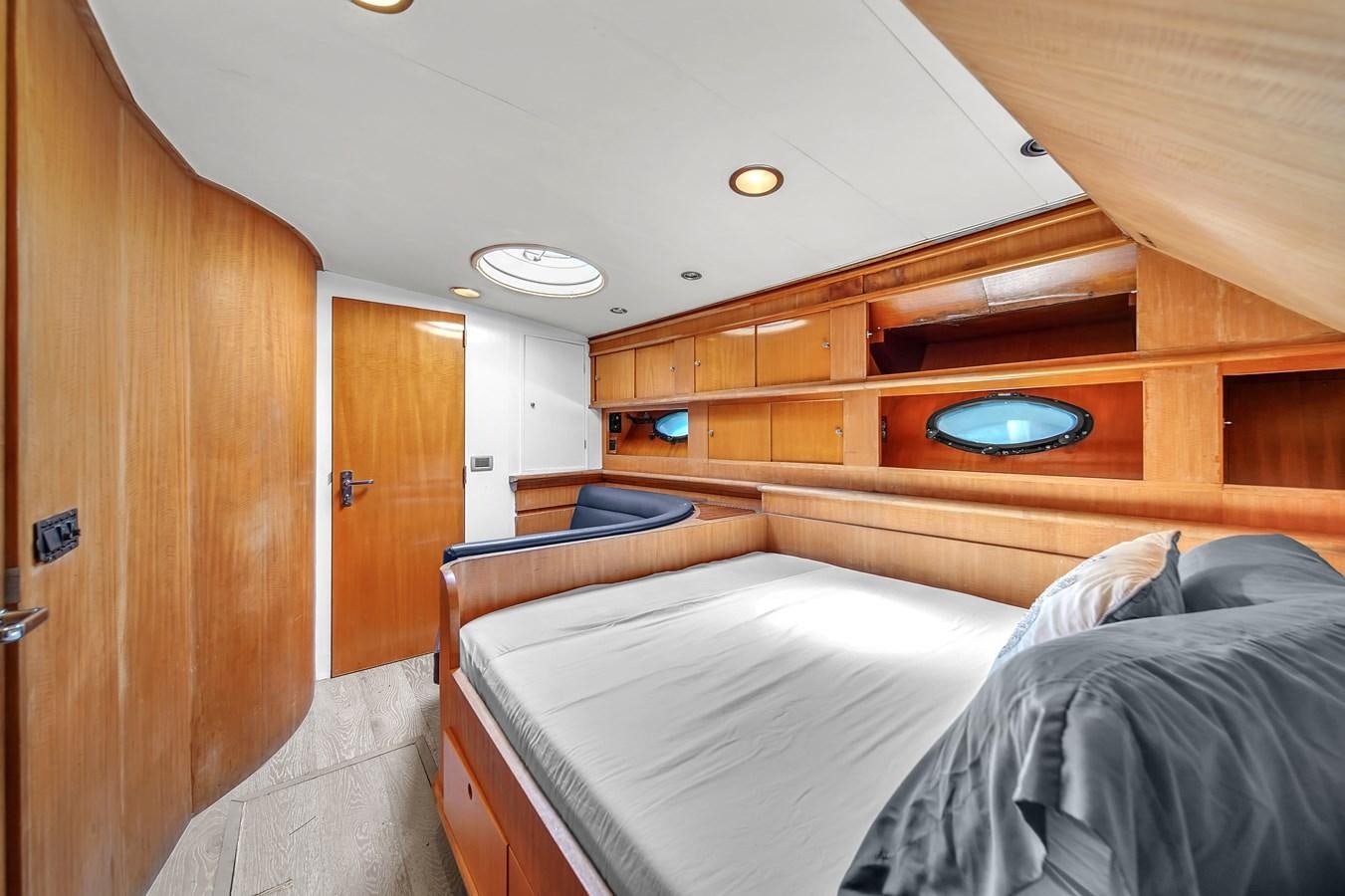 a room with two beds aboard ZOOOM Yacht for Sale