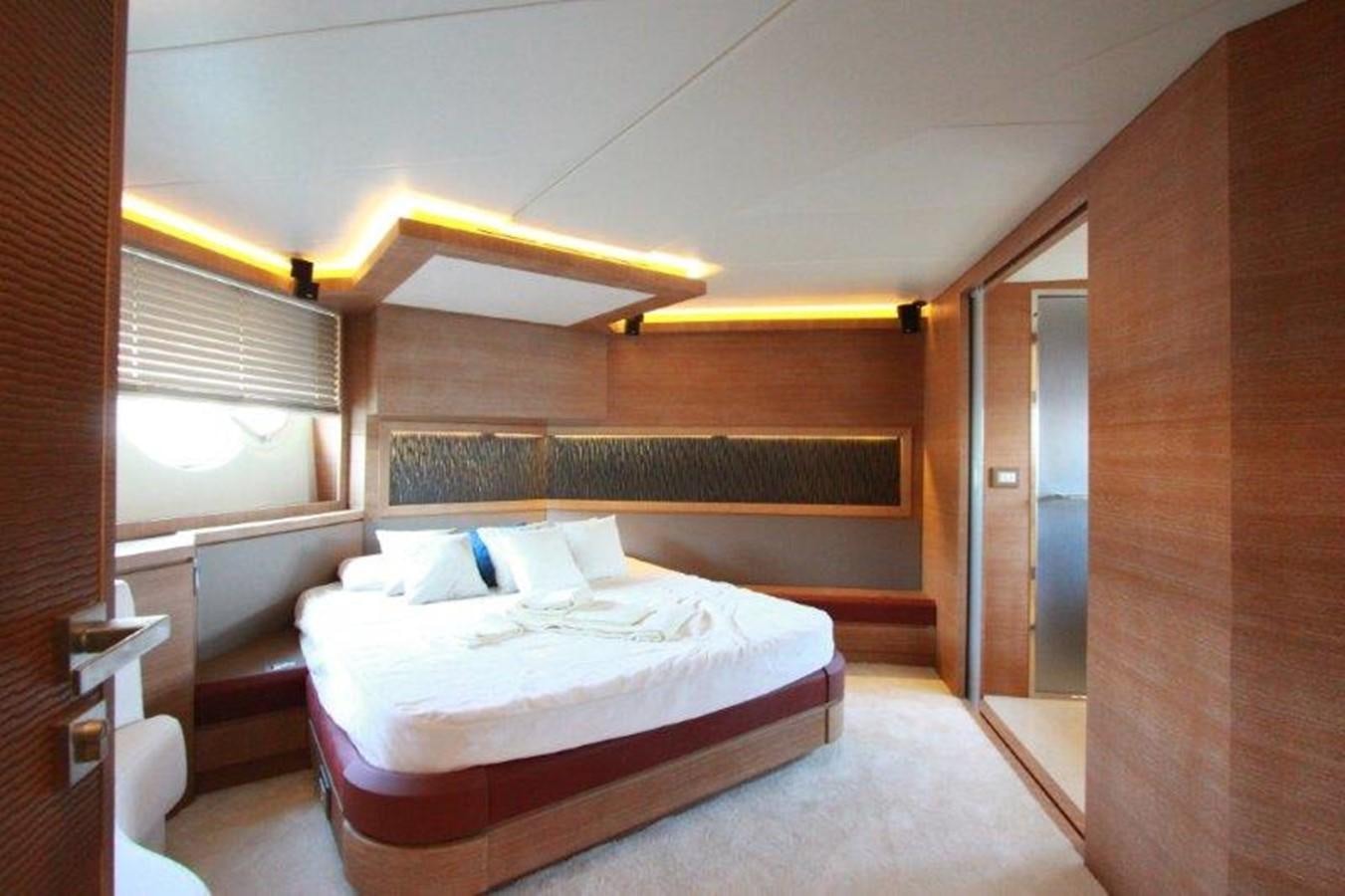 a room with a bed and a window aboard AURORE Yacht for Sale