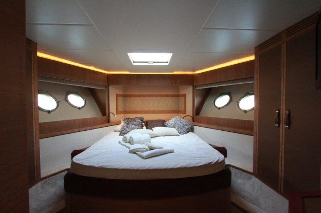 a bed in a room aboard AURORE Yacht for Sale