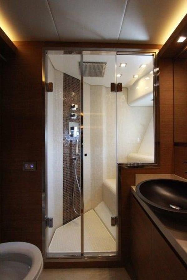 a bathroom with a shower unit aboard AURORE Yacht for Sale