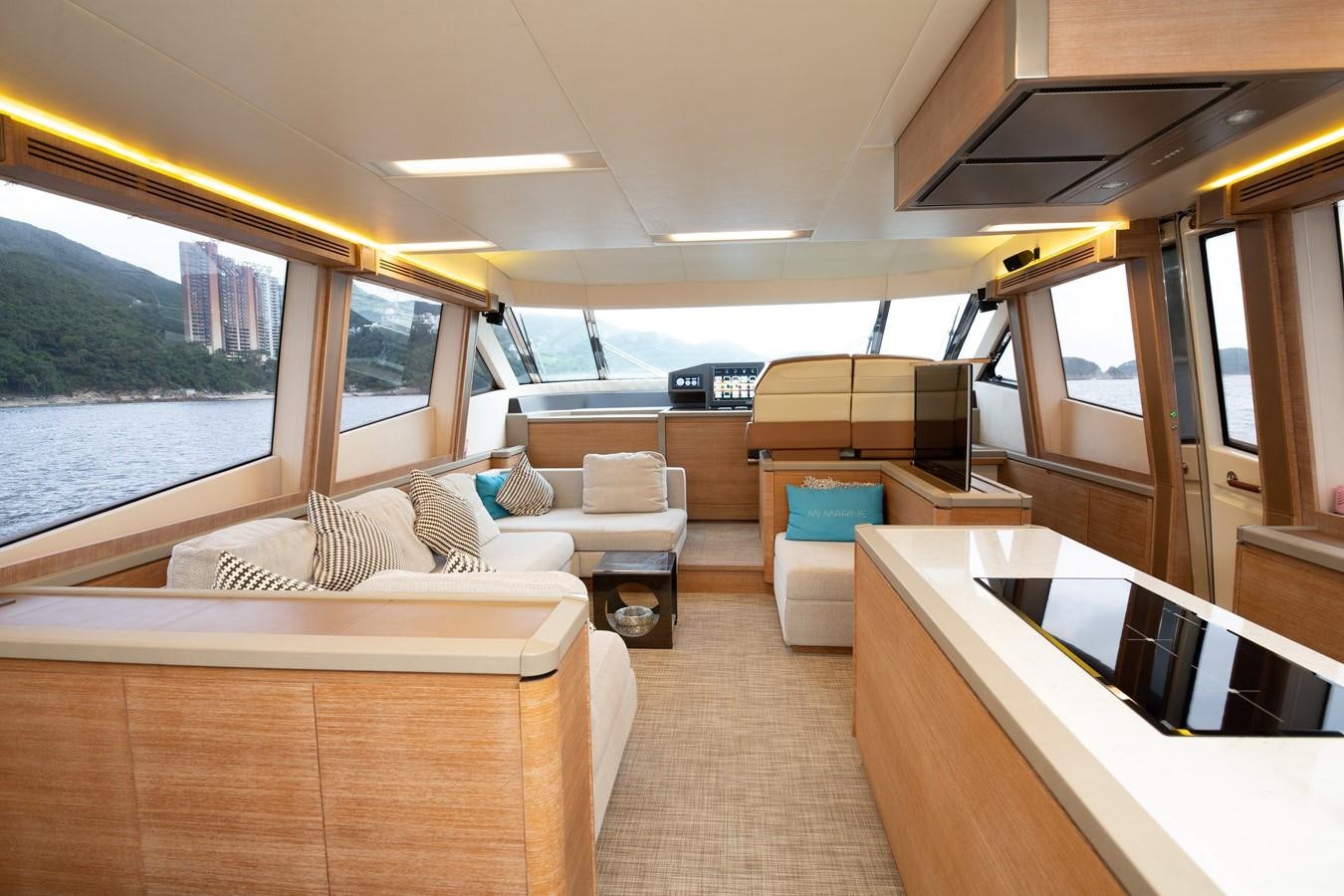 a room with a bed and a couch aboard AURORE Yacht for Sale