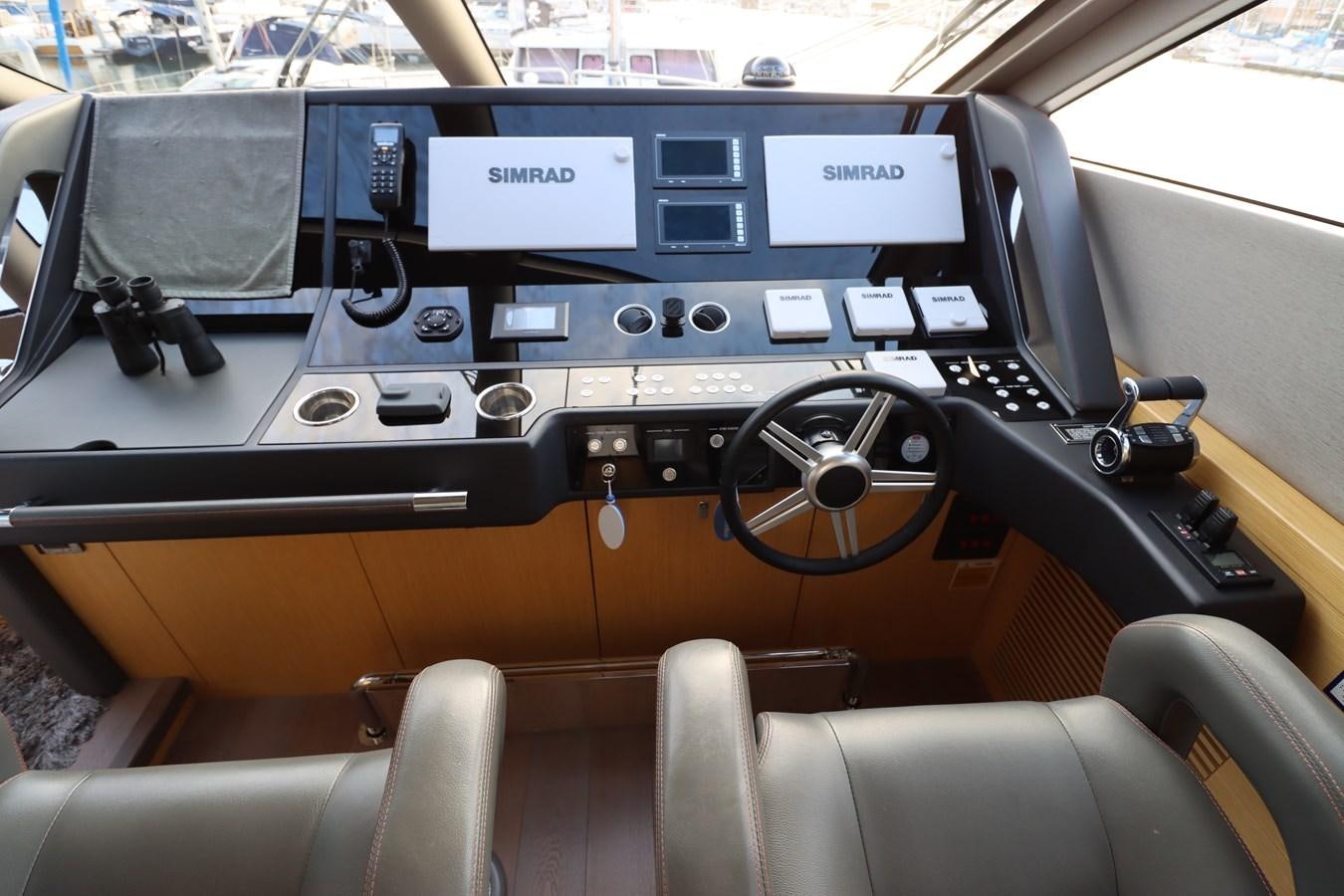 the inside of a car aboard MOJO RISIN Yacht for Sale