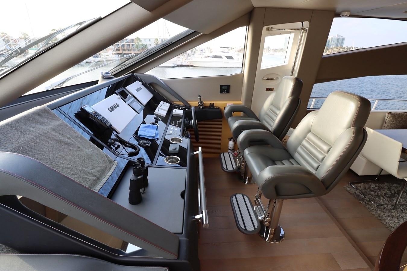 a room with a group of computers aboard MOJO RISIN Yacht for Sale