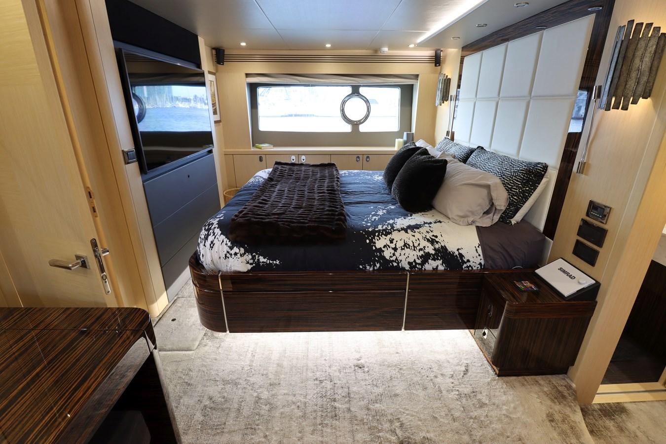a bed in a room aboard MOJO RISIN Yacht for Sale