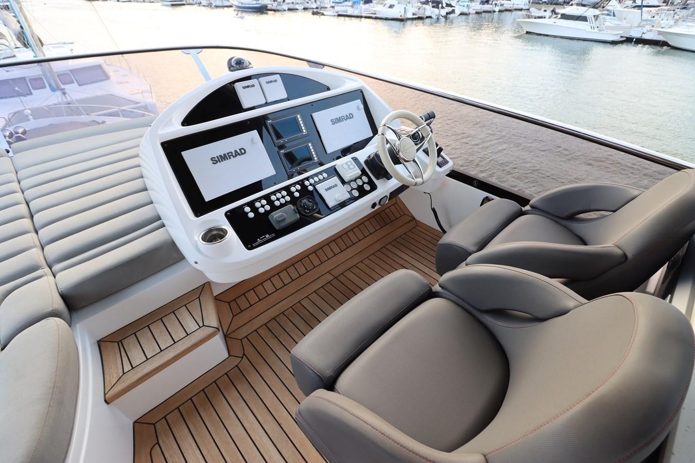 the interior of a car aboard MOJO RISIN Yacht for Sale