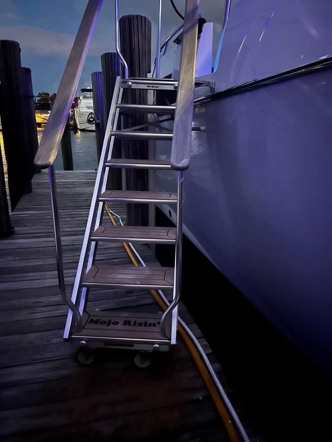 a ladder leaning against a wall aboard MOJO RISIN Yacht for Sale