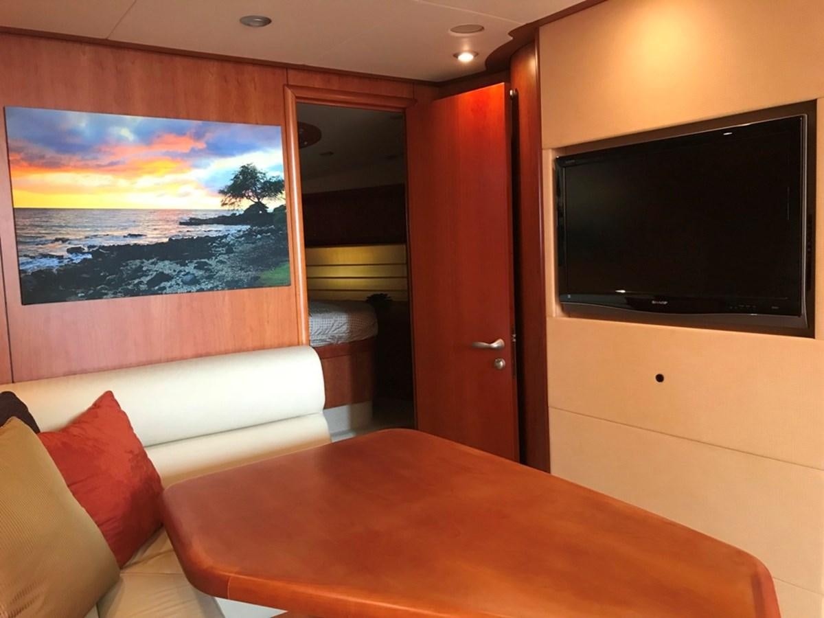 a hotel room with a tv on the wall aboard DAY DREAMER Yacht for Sale