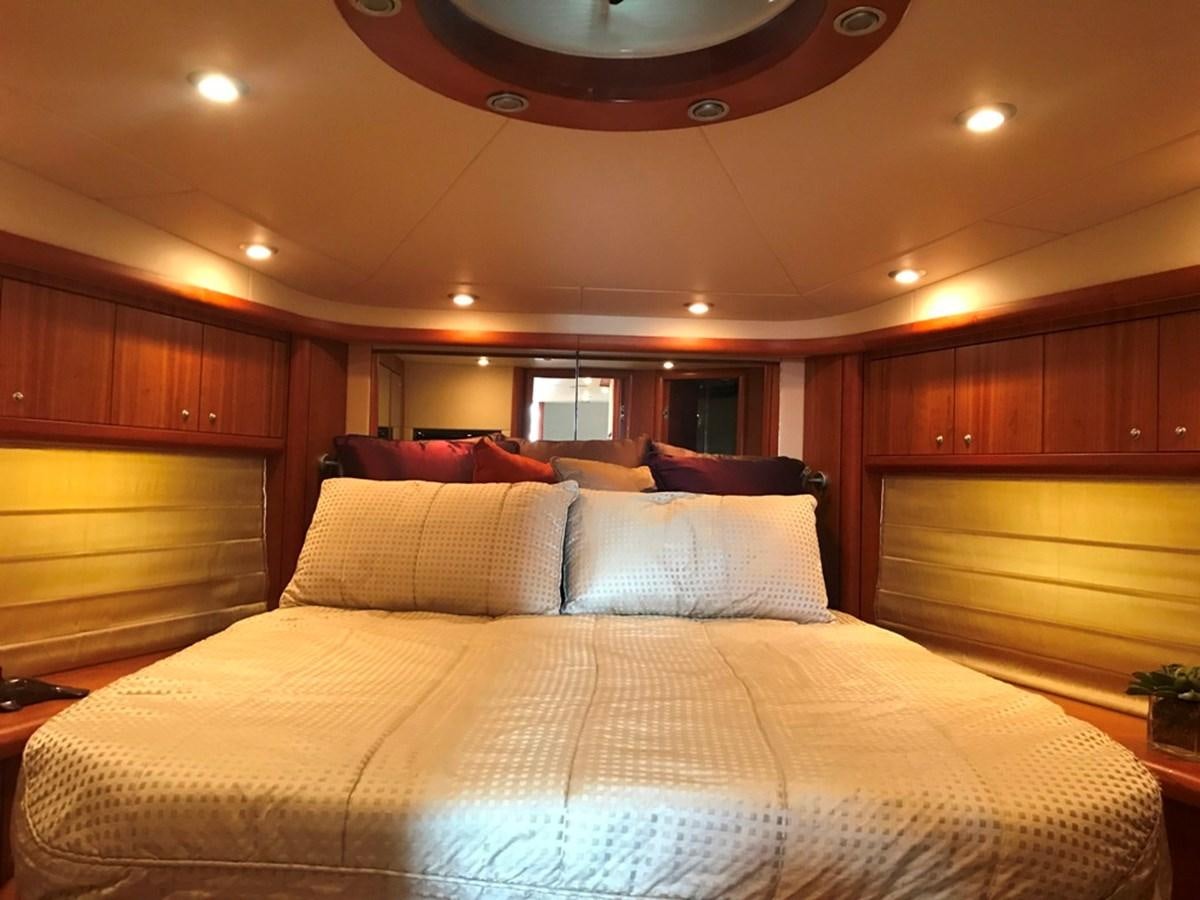 a large bed in a room aboard DAY DREAMER Yacht for Sale