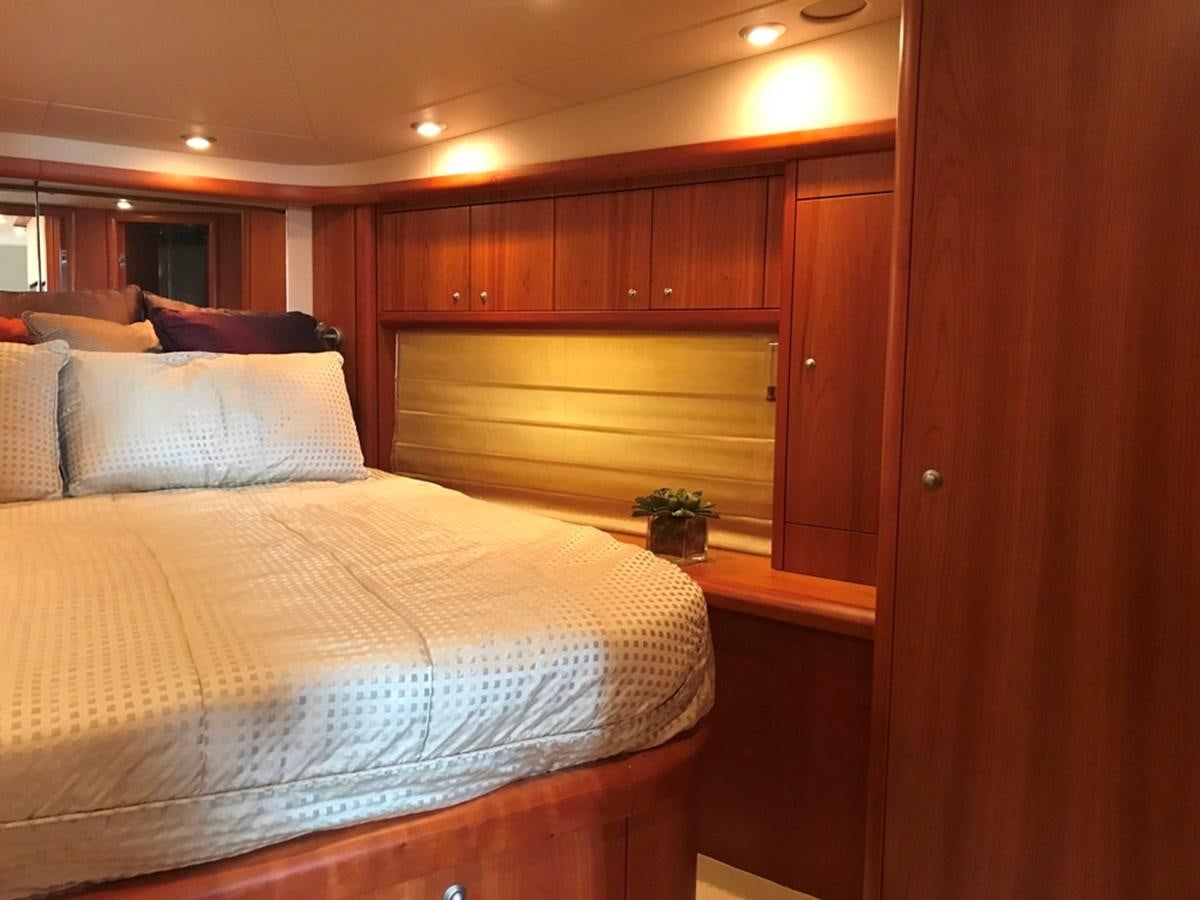 a bed in a room aboard DAY DREAMER Yacht for Sale