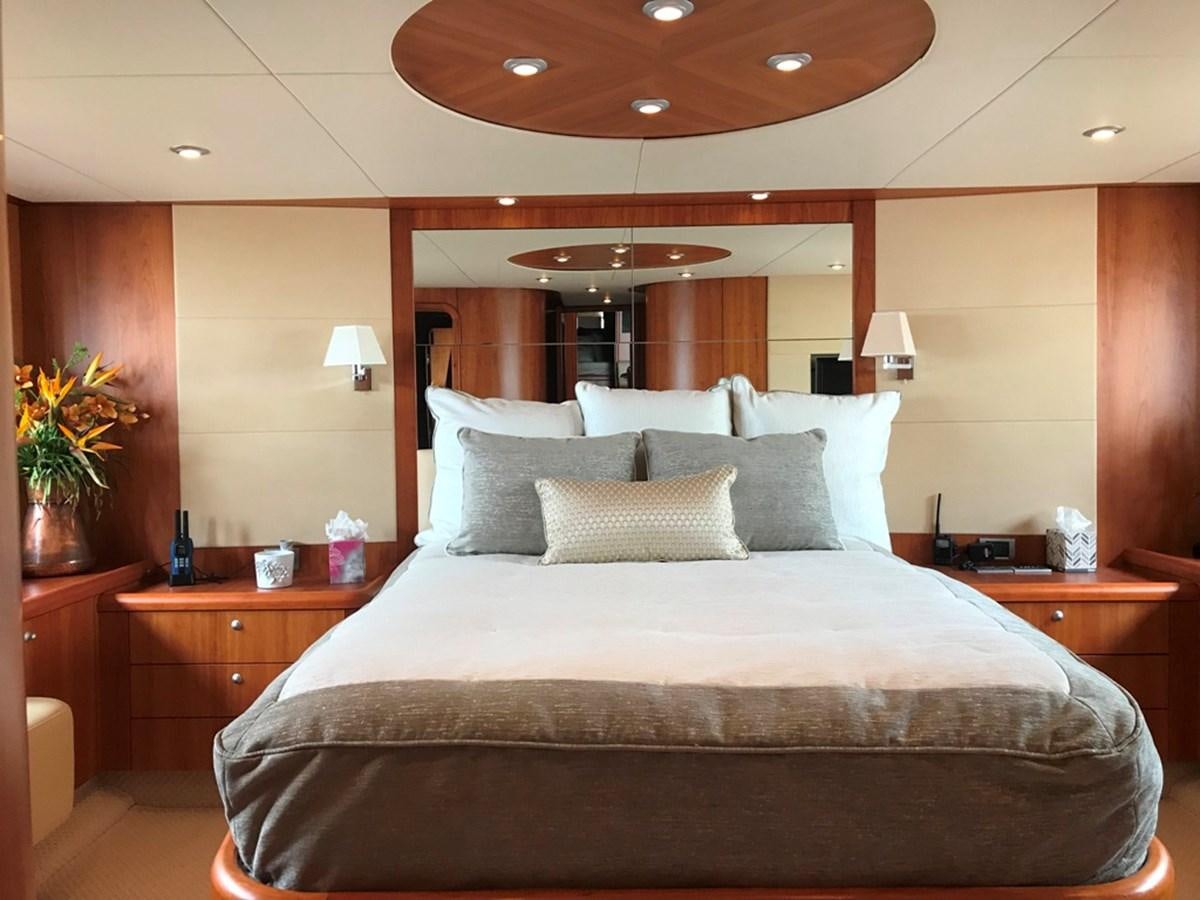 a bed with a large bed aboard DAY DREAMER Yacht for Sale