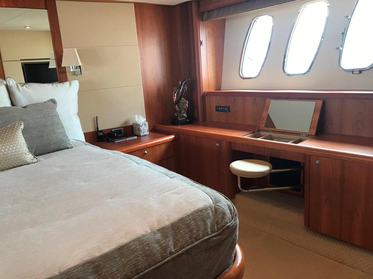 a bed in a room aboard DAY DREAMER Yacht for Sale