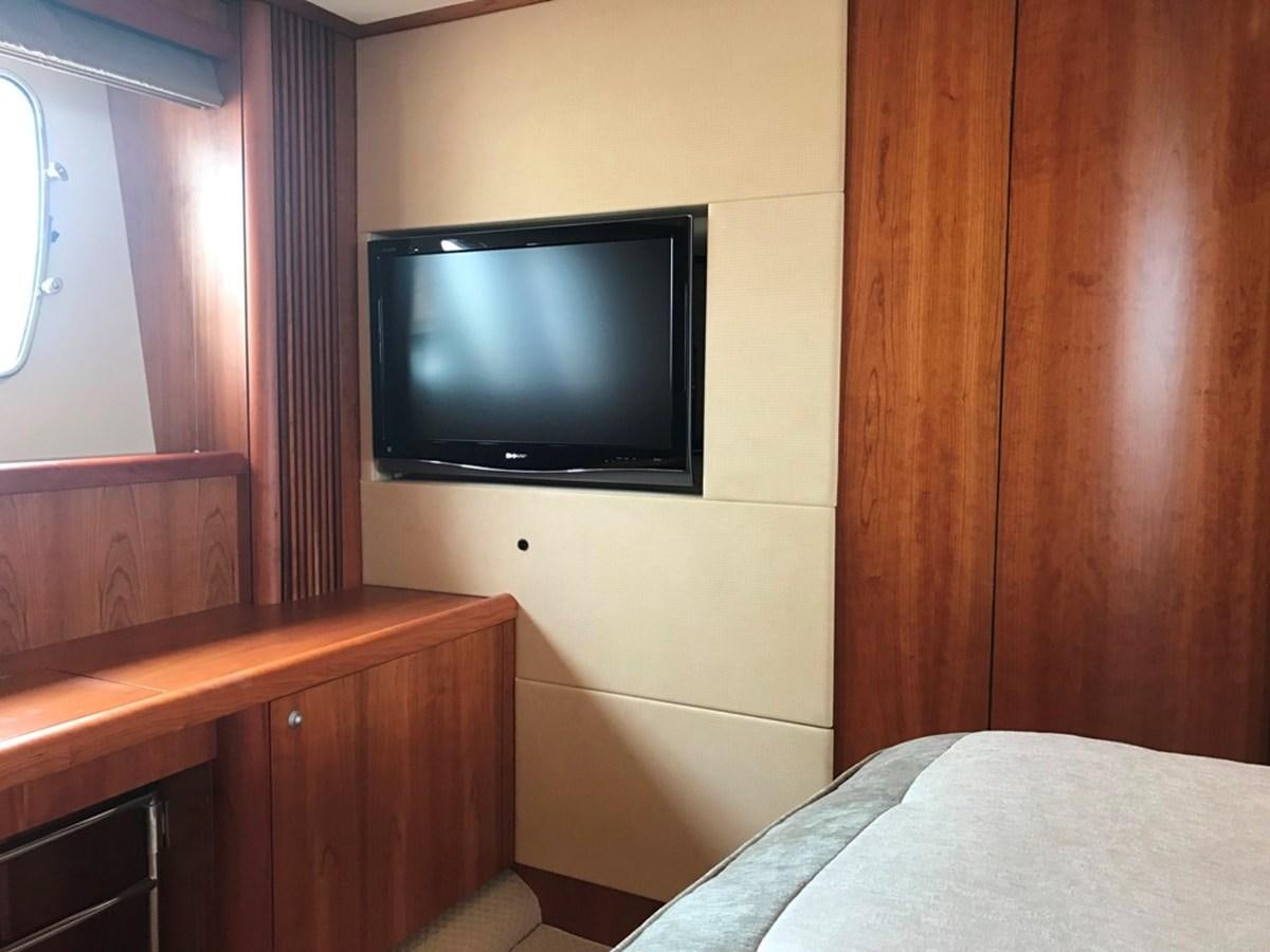 a tv on a wall aboard DAY DREAMER Yacht for Sale