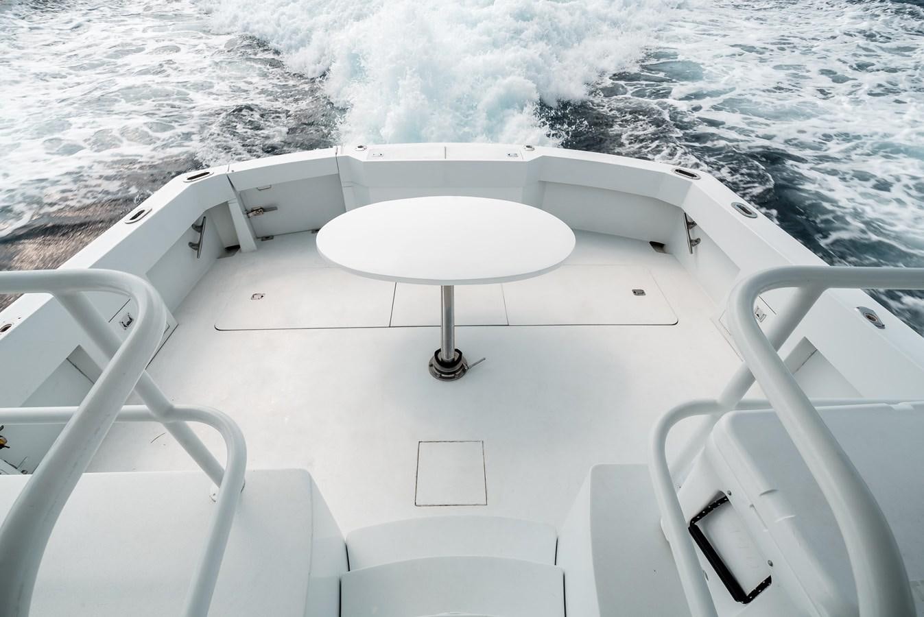 a white table on a boat aboard JUST LIKE THAT Yacht for Sale