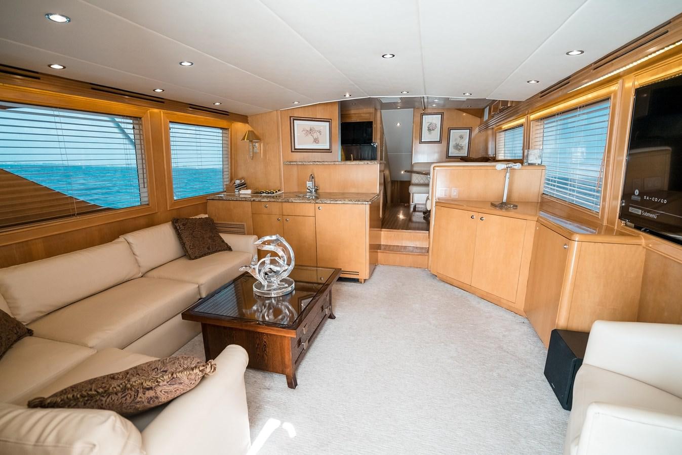 a living room with a couch and a coffee table aboard JUST LIKE THAT Yacht for Sale