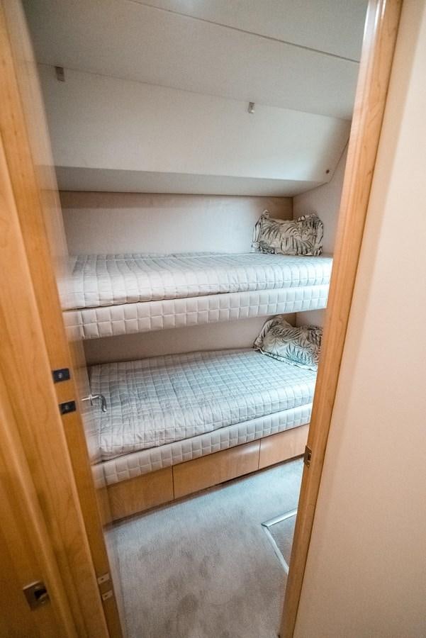 a closet with a bed aboard JUST LIKE THAT Yacht for Sale