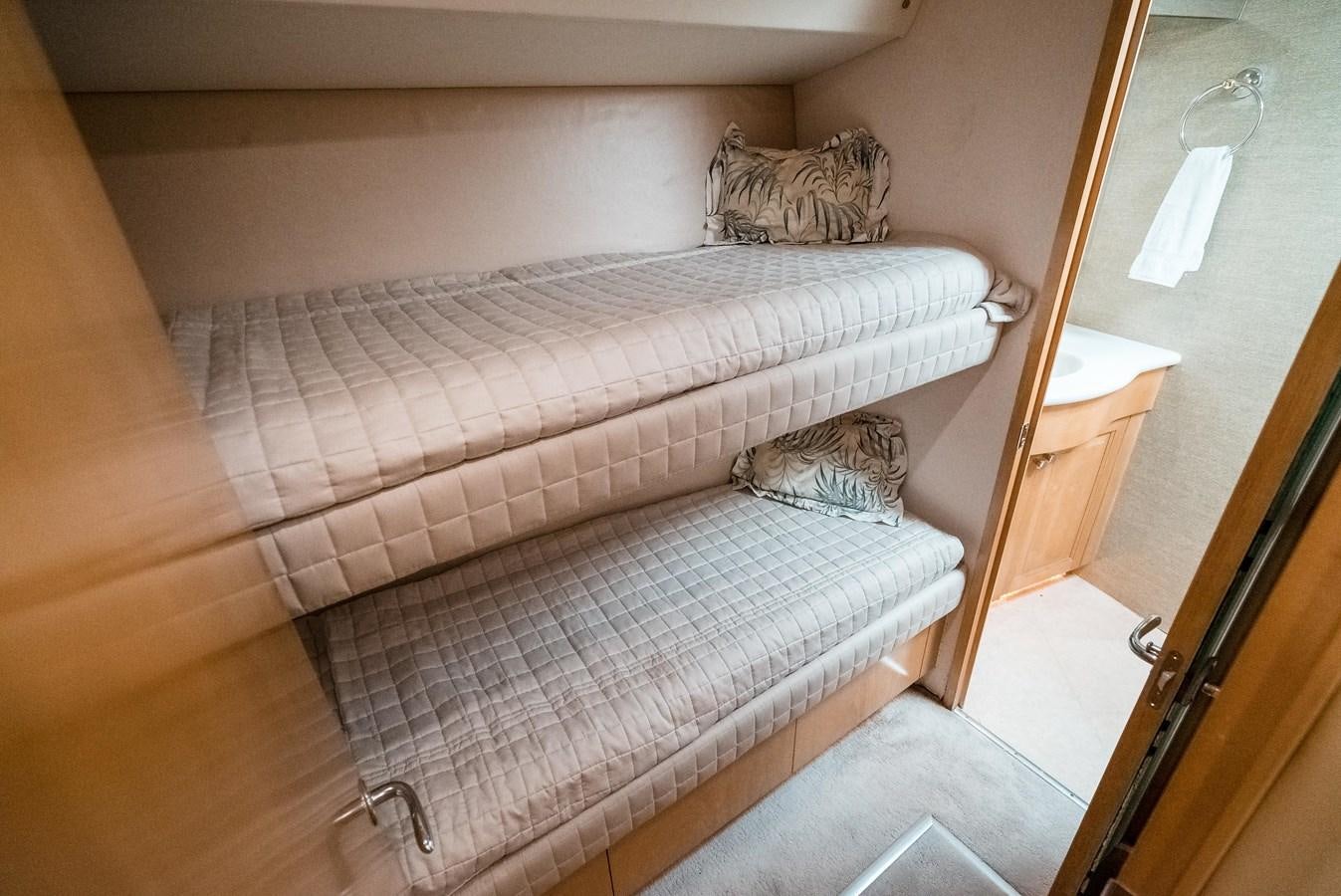 a bed in a room aboard JUST LIKE THAT Yacht for Sale