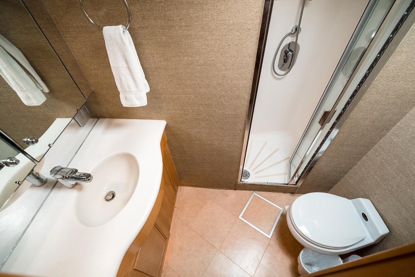 a bathroom with a sink and toilet aboard JUST LIKE THAT Yacht for Sale