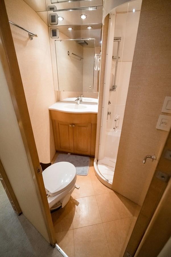 a bathroom with a toilet and sink aboard JUST LIKE THAT Yacht for Sale