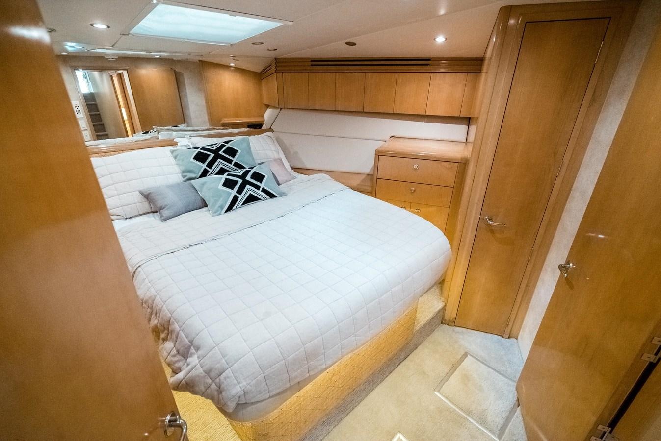 a bed in a room aboard JUST LIKE THAT Yacht for Sale