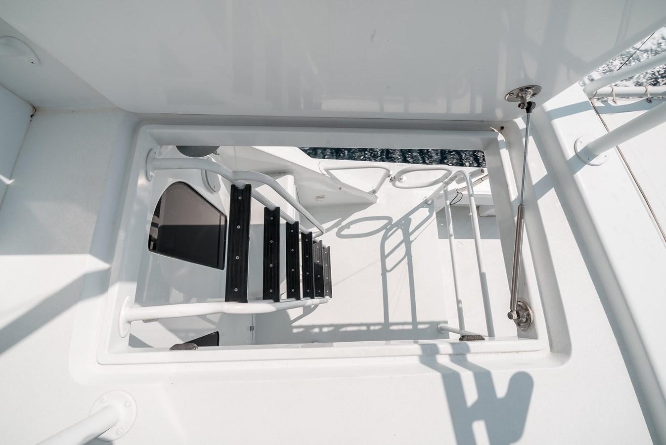 a white object with a black object on it aboard JUST LIKE THAT Yacht for Sale