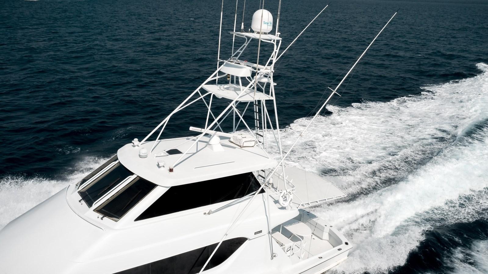 a white boat on the water aboard JUST LIKE THAT Yacht for Sale