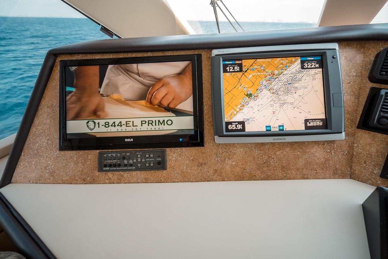 a tablet with a picture of a person on it aboard JUST LIKE THAT Yacht for Sale