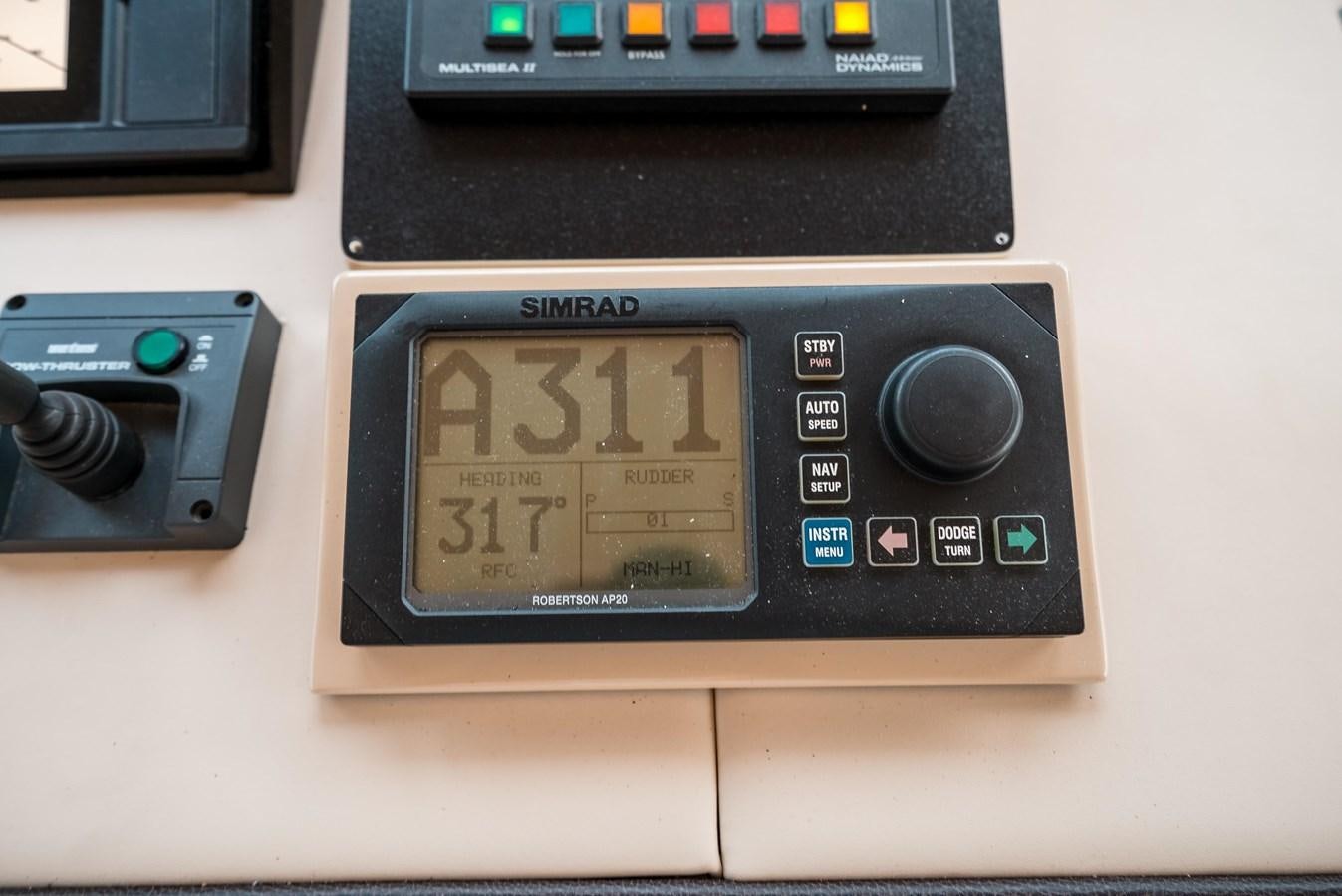 a digital clock on a wall aboard JUST LIKE THAT Yacht for Sale