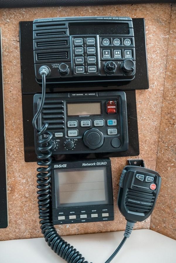 a black telephone with a screen and a charger aboard JUST LIKE THAT Yacht for Sale