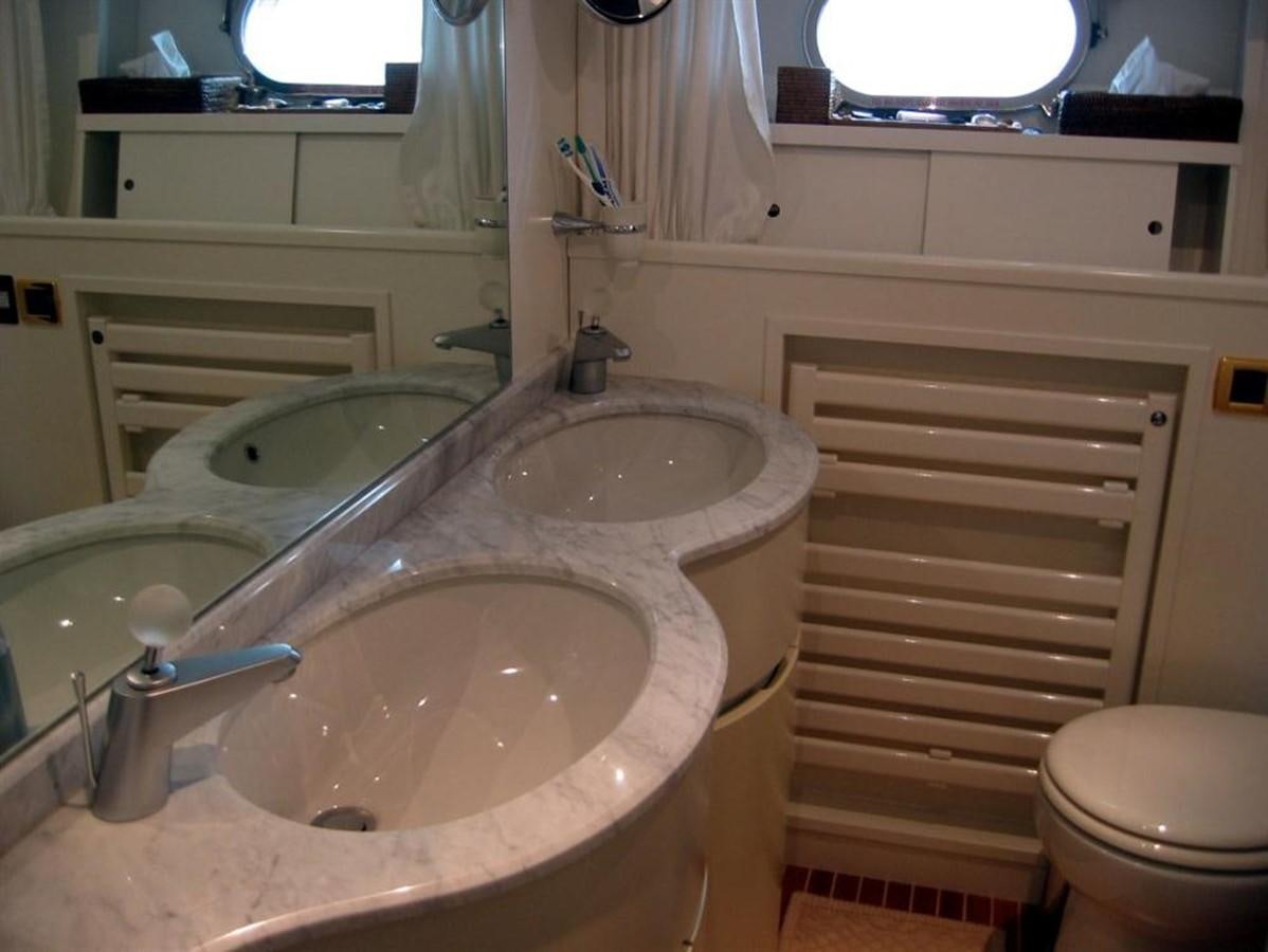 a bathroom with a sink and a toilet aboard CACAO BAY Yacht for Sale