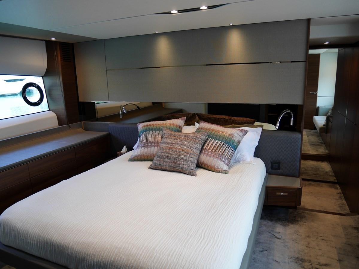 a bed with pillows aboard KATI Yacht for Sale