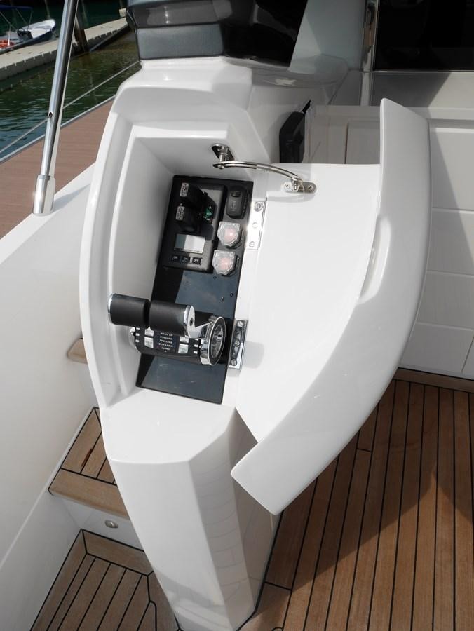 a white machine with a black handle aboard KATI Yacht for Sale