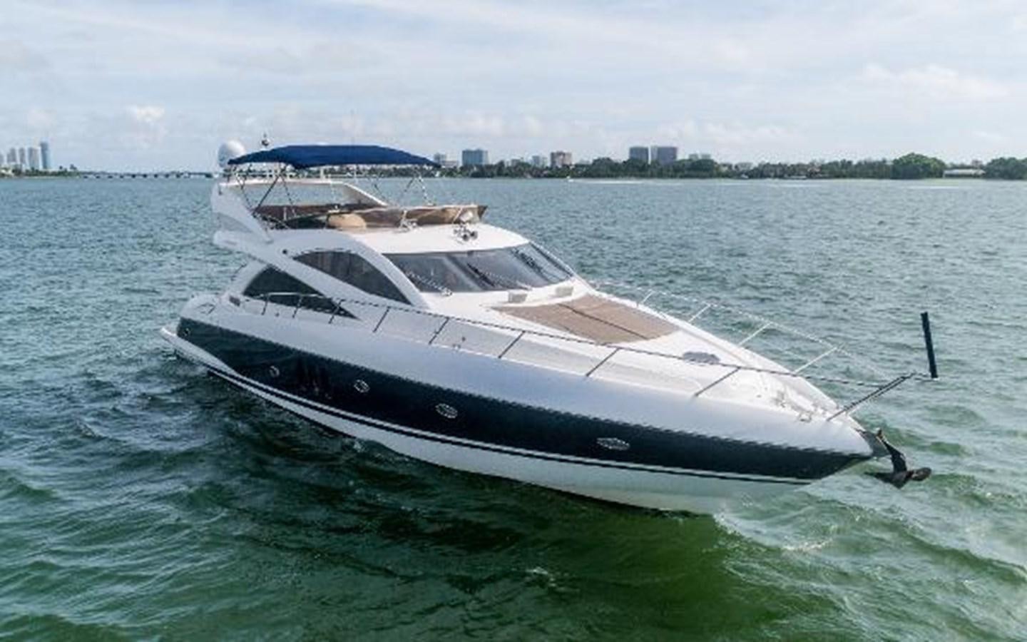 a white yacht in the water aboard SOLE MIO Yacht for Sale