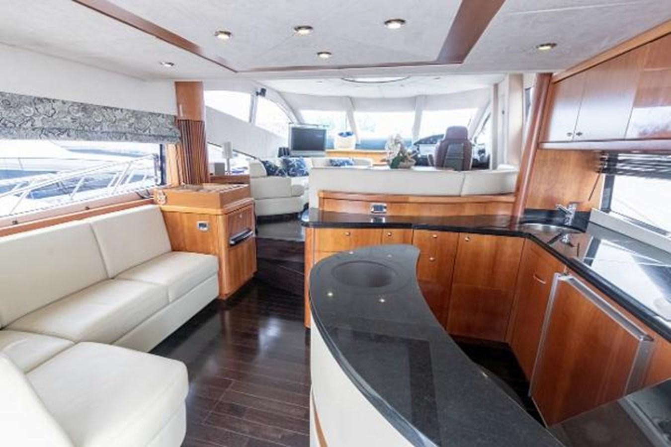 a large kitchen with a large window aboard SOLE MIO Yacht for Sale