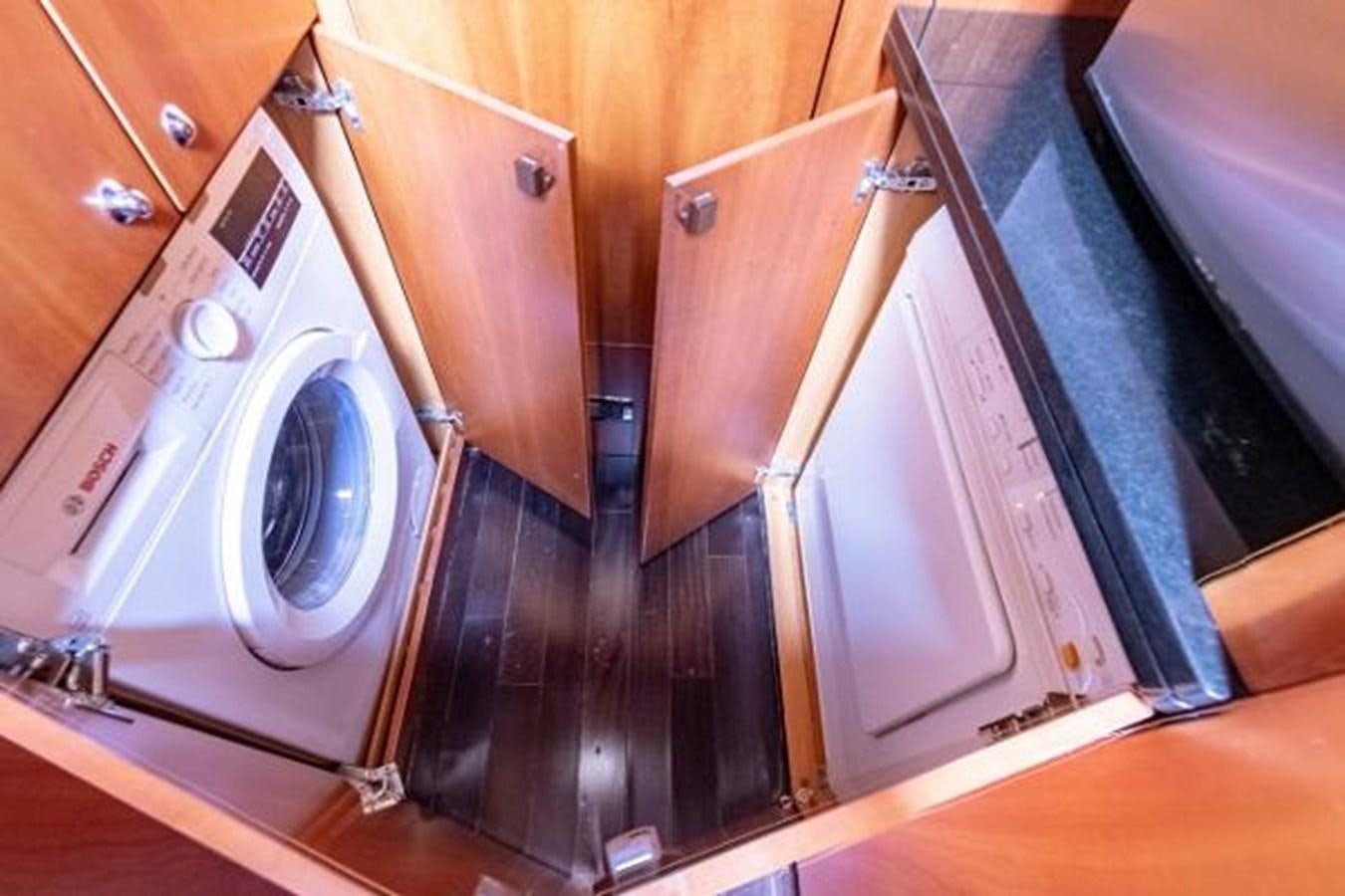 a white washing machine aboard SOLE MIO Yacht for Sale