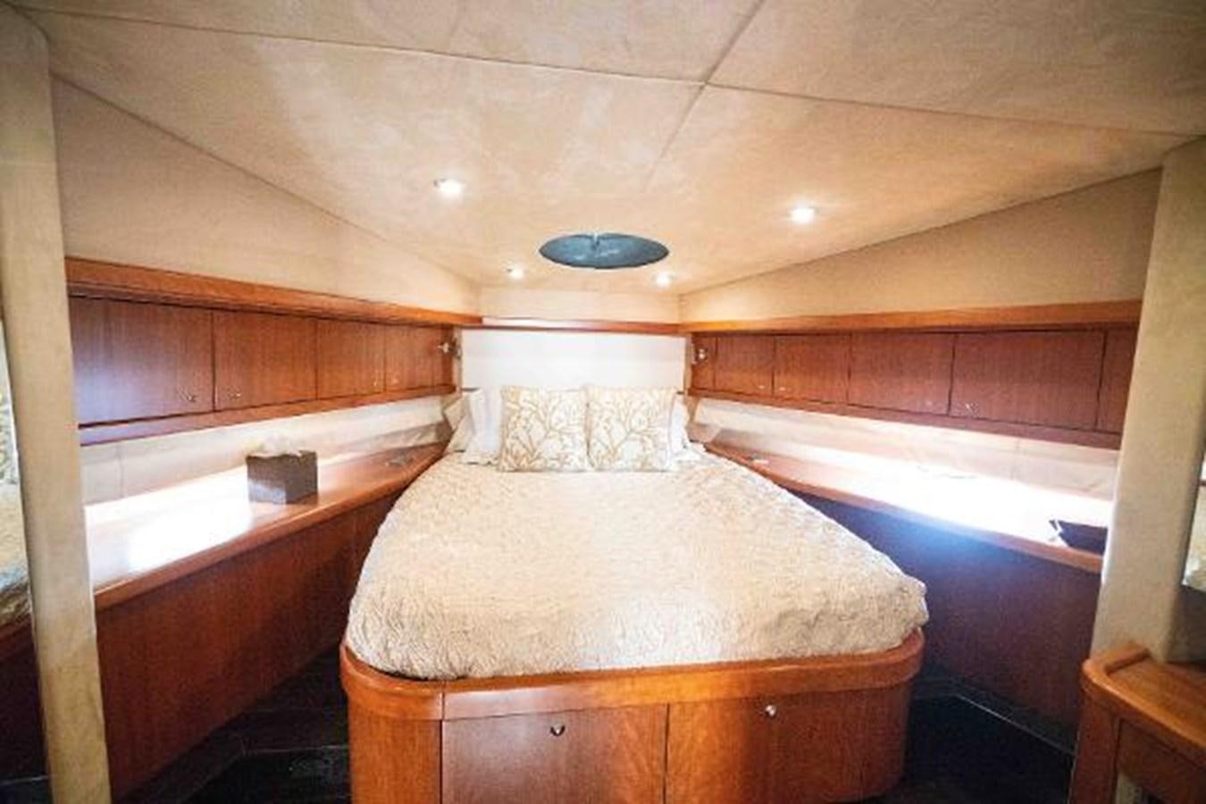 a room with a bed and a pool aboard SOLE MIO Yacht for Sale