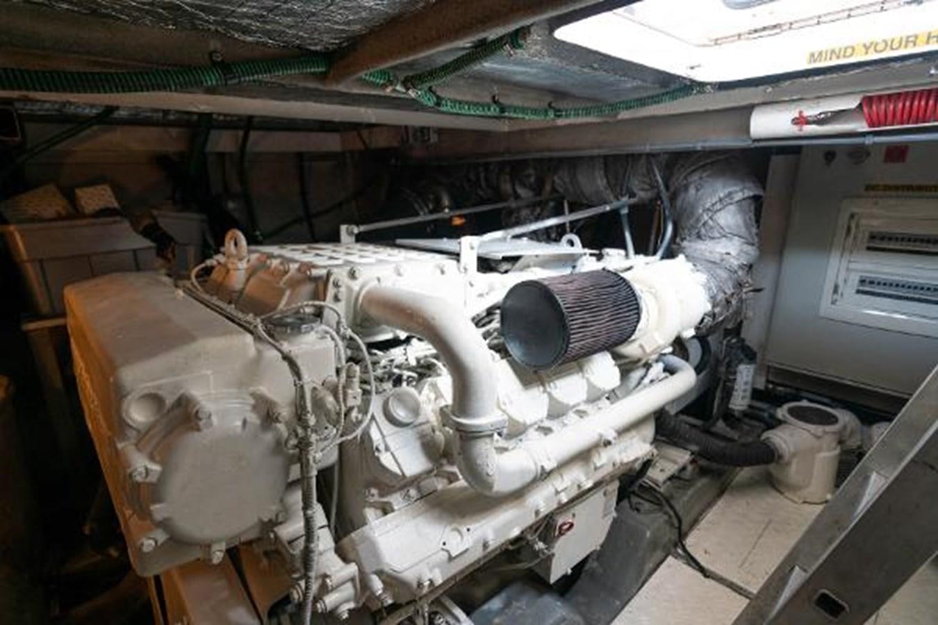a car with a large engine aboard SOLE MIO Yacht for Sale