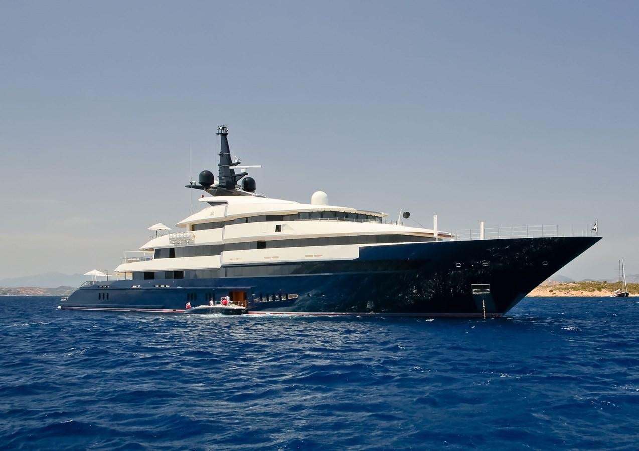 a large ship in the water aboard MAN OF STEEL Yacht for Sale