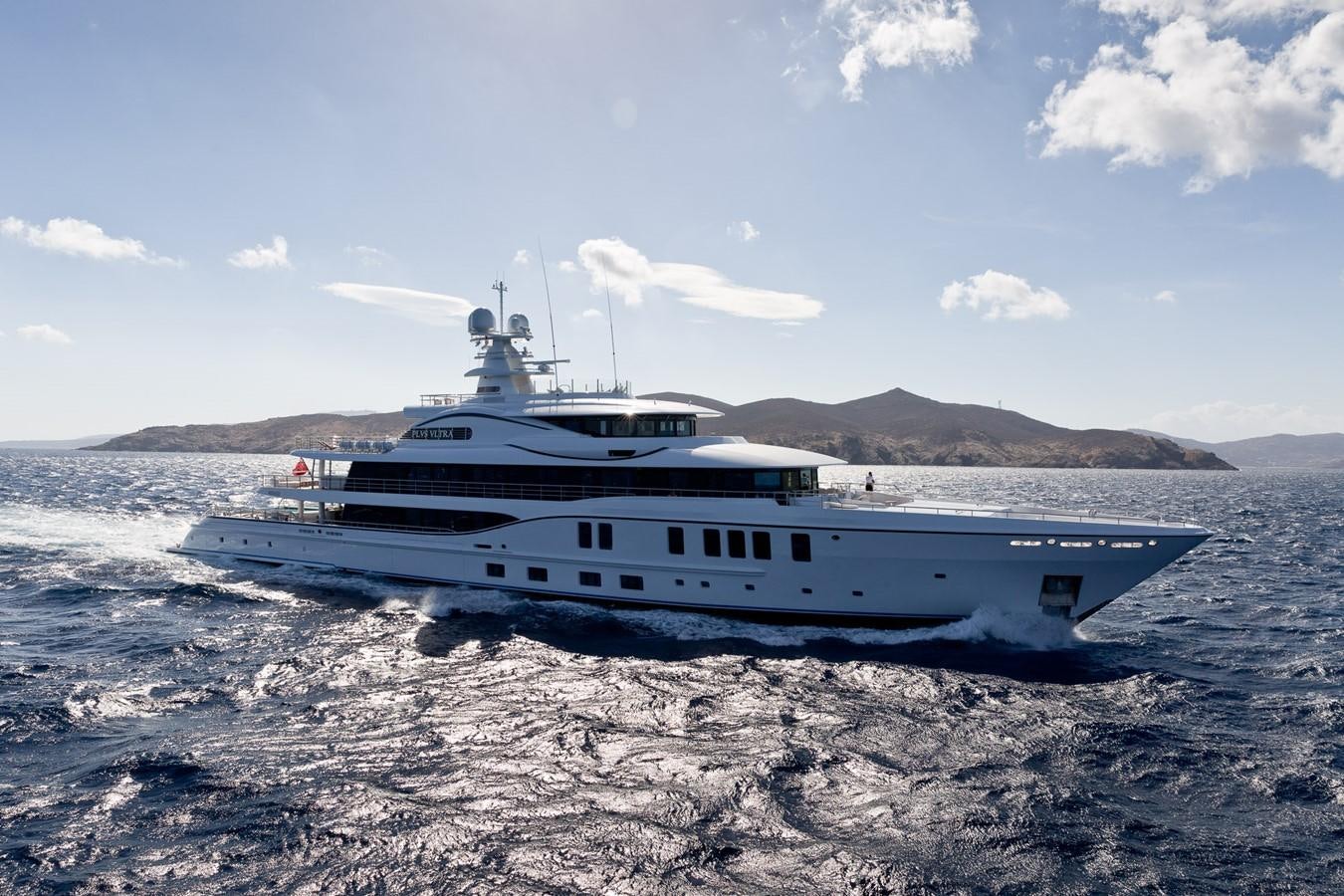 a boat on the beach aboard PLVS VLTRA Yacht for Sale