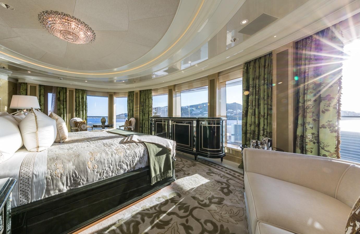 a large bedroom with a balcony aboard PLVS VLTRA Yacht for Sale