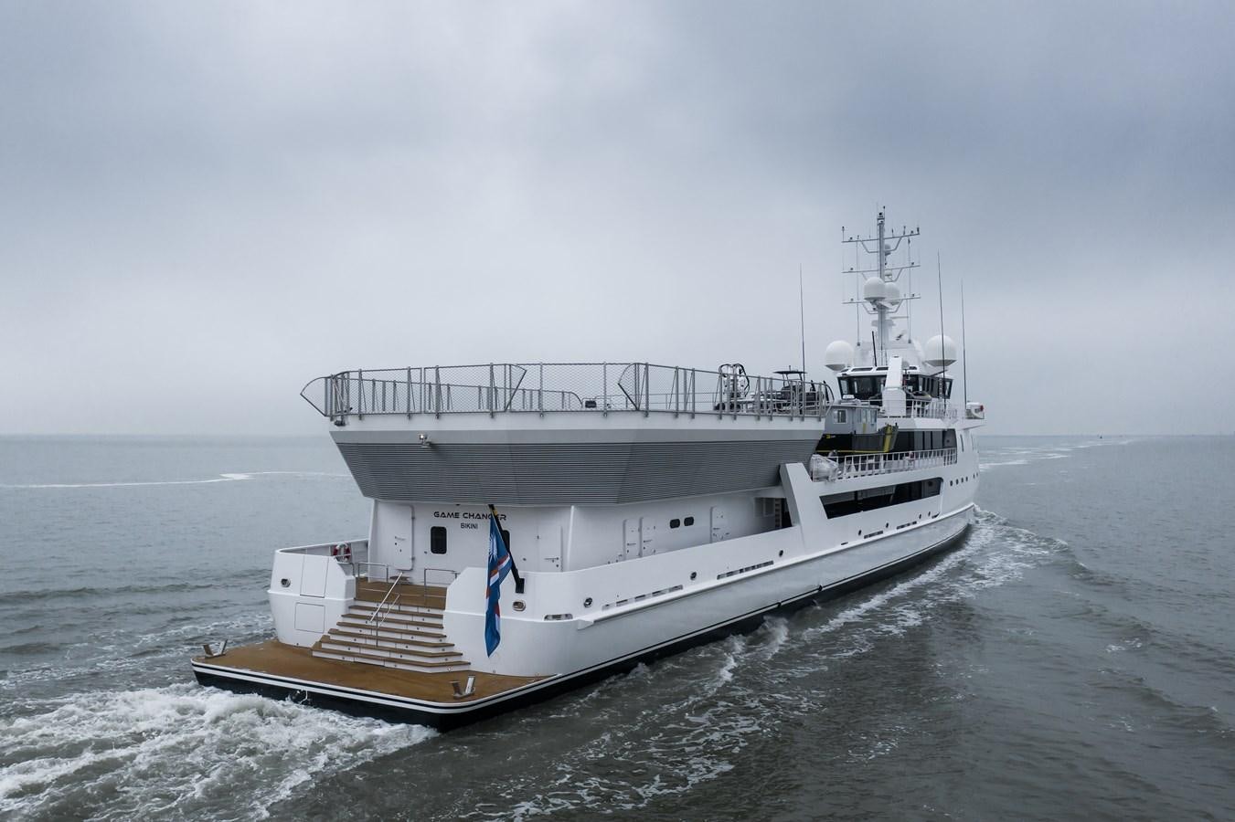 a large ship in the water aboard GAME CHANGER Yacht for Sale