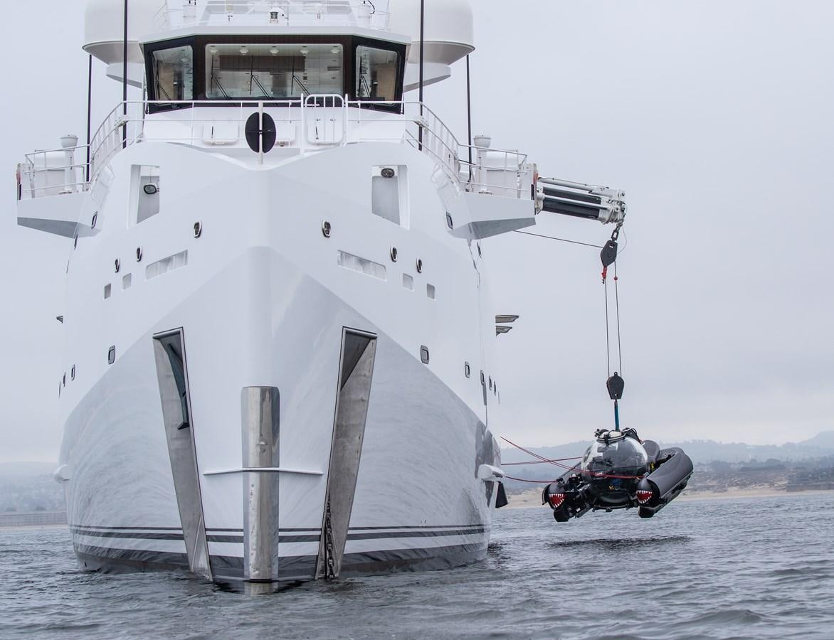 a boat with a motor attached to it aboard GAME CHANGER Yacht for Sale