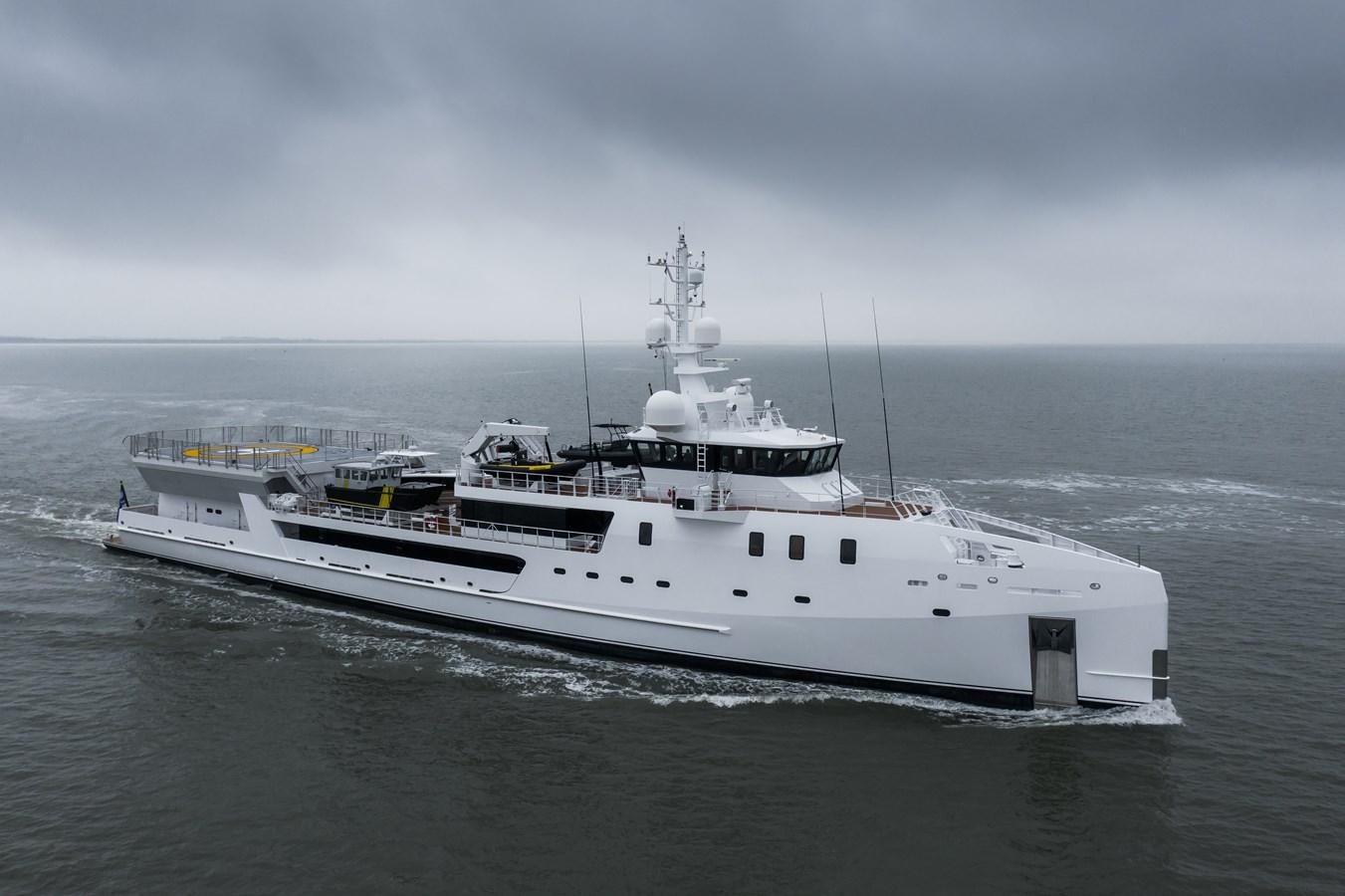 a large white boat in the water aboard GAME CHANGER Yacht for Sale