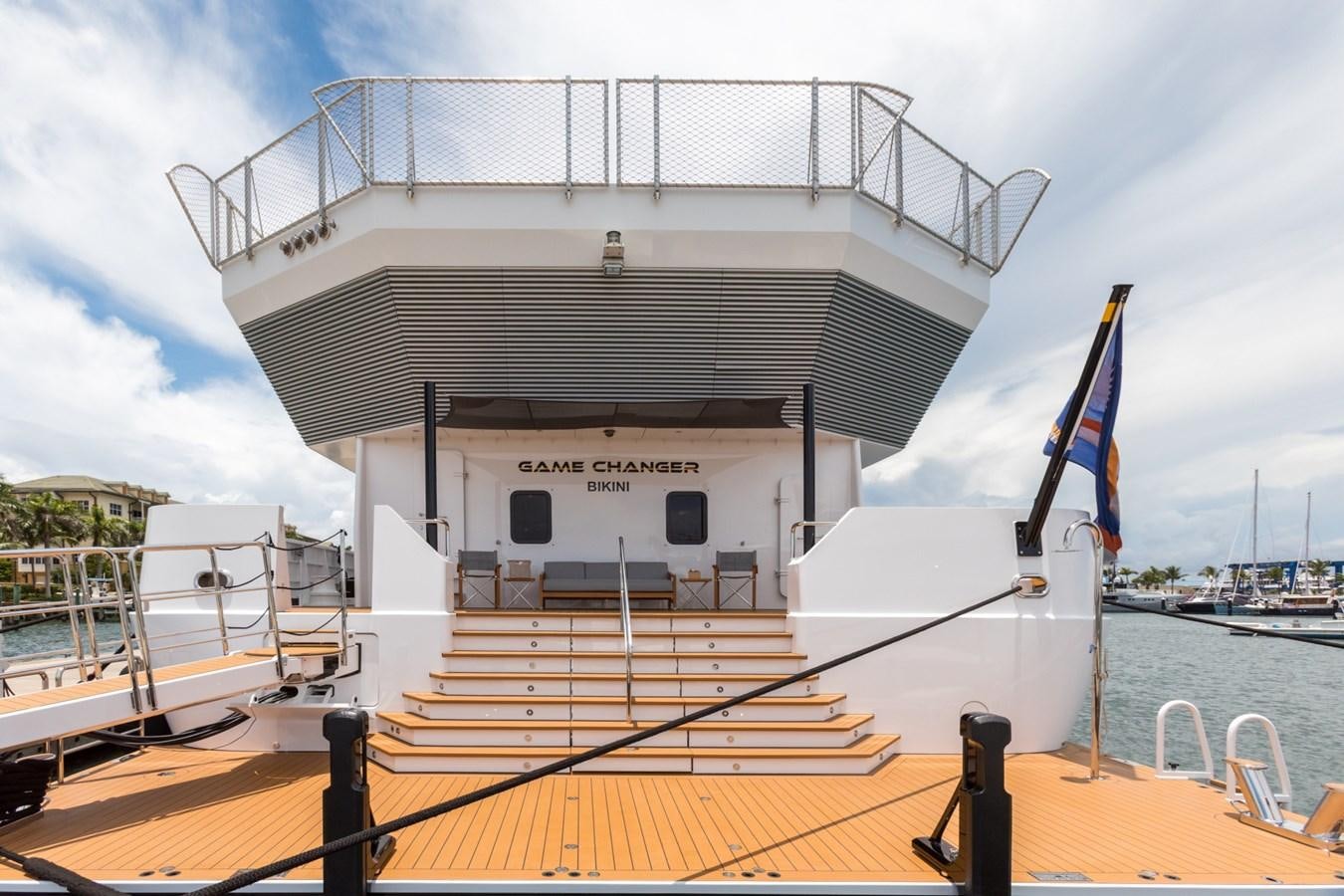 a boat docked at a pier aboard GAME CHANGER Yacht for Sale